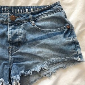 Mid Rise Frayed Denim Shorts